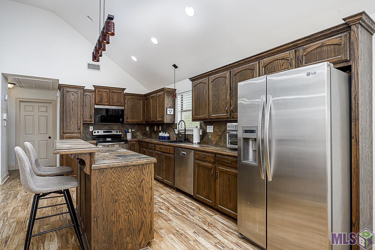 21260 Diversion Canal Road St. Amant, LA 70774 - Photo 8 of 40 Plenty of Cabinetry