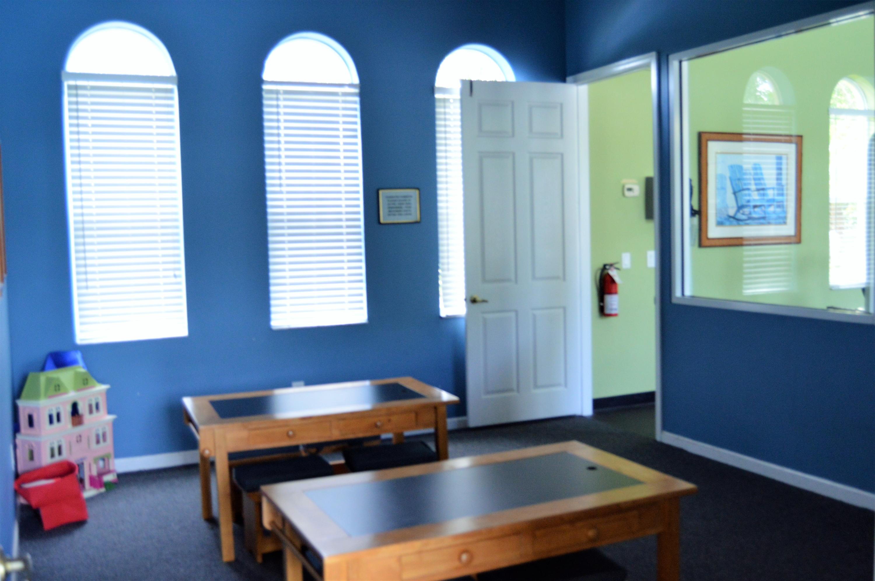 6204 Sandy Bank Terrace West Palm Beach, FL 33407 - Photo 30 of 37 a room with two chairs and a window