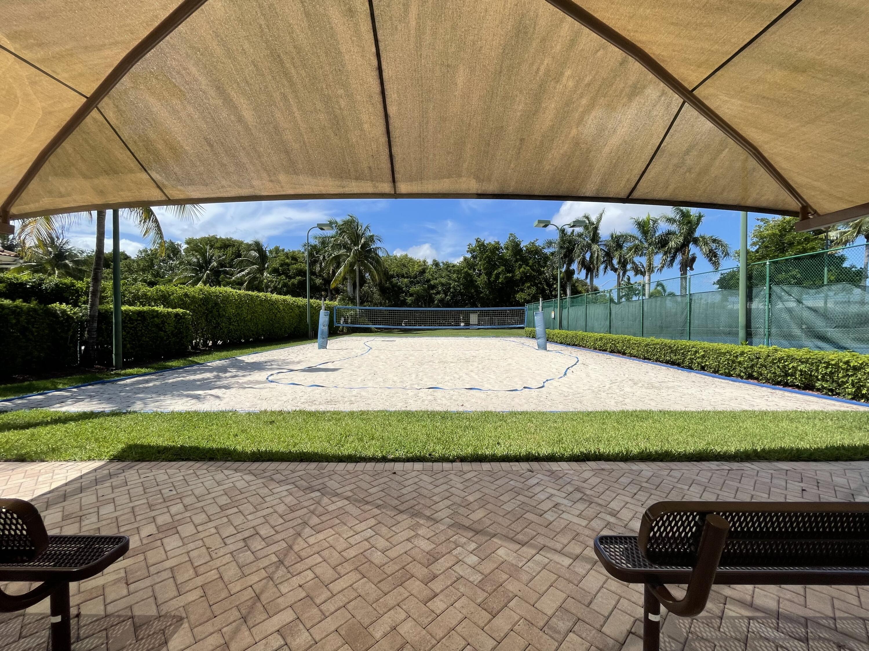 6204 Sandy Bank Terrace West Palm Beach, FL 33407 - Photo 35 of 37 a swimming pool with an outdoor seating
