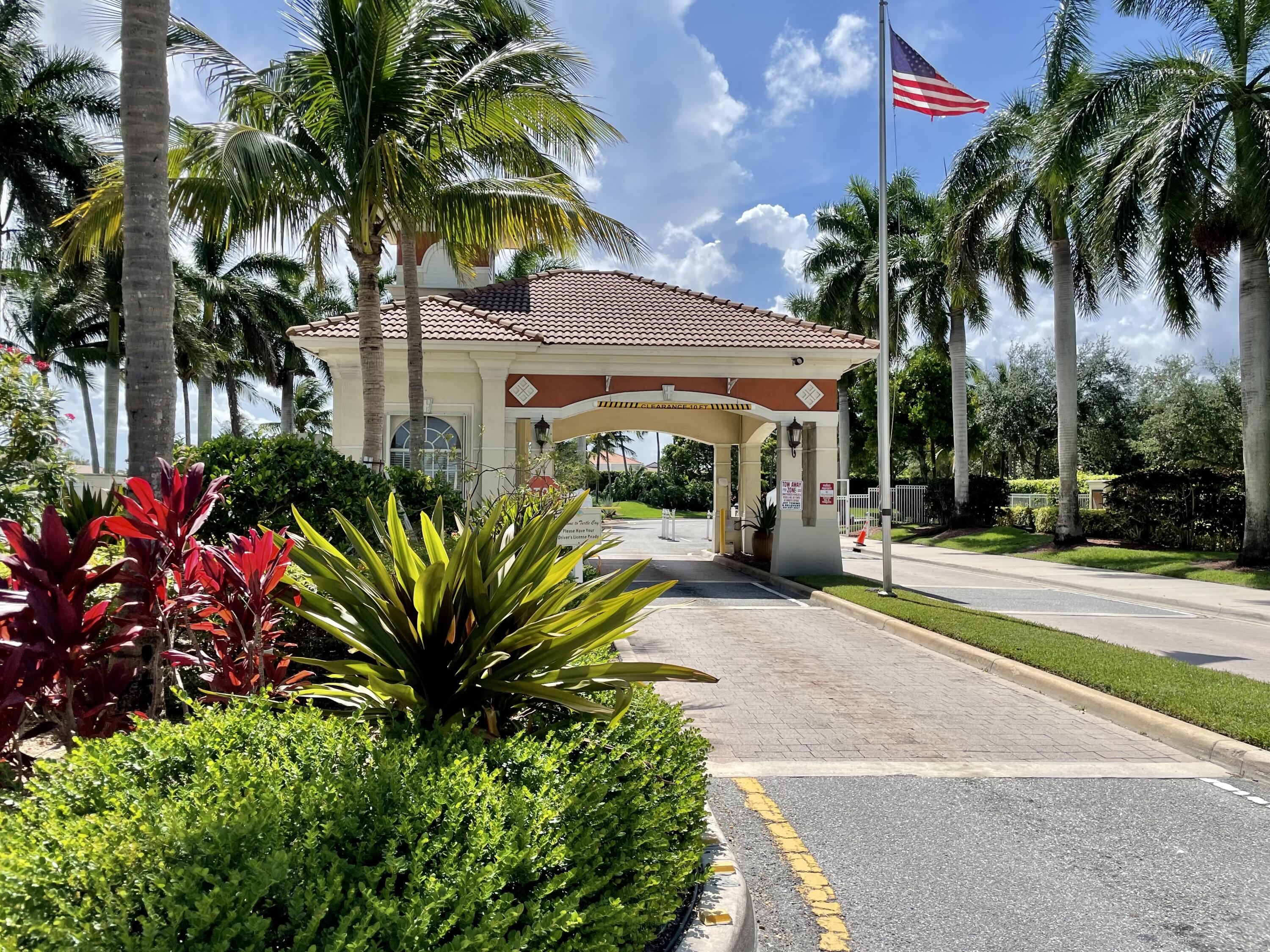 6204 Sandy Bank Terrace West Palm Beach, FL 33407 - Photo 36 of 37 a plant is in front of a house