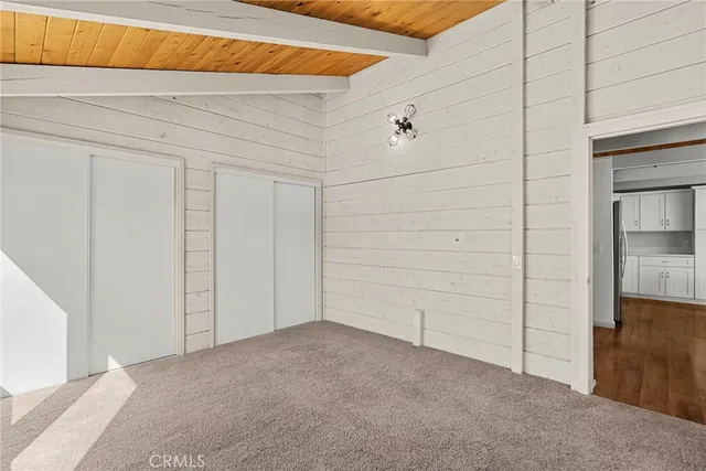 a view of an empty room with racks