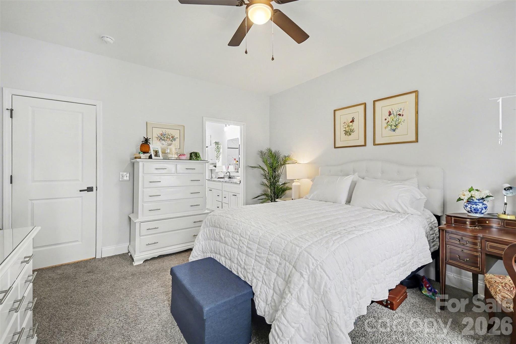 3236 Cottage Rose Lane Rock Hill, SC 29732 - Photo 14 of 27 a bedroom with a bed and a chandelier