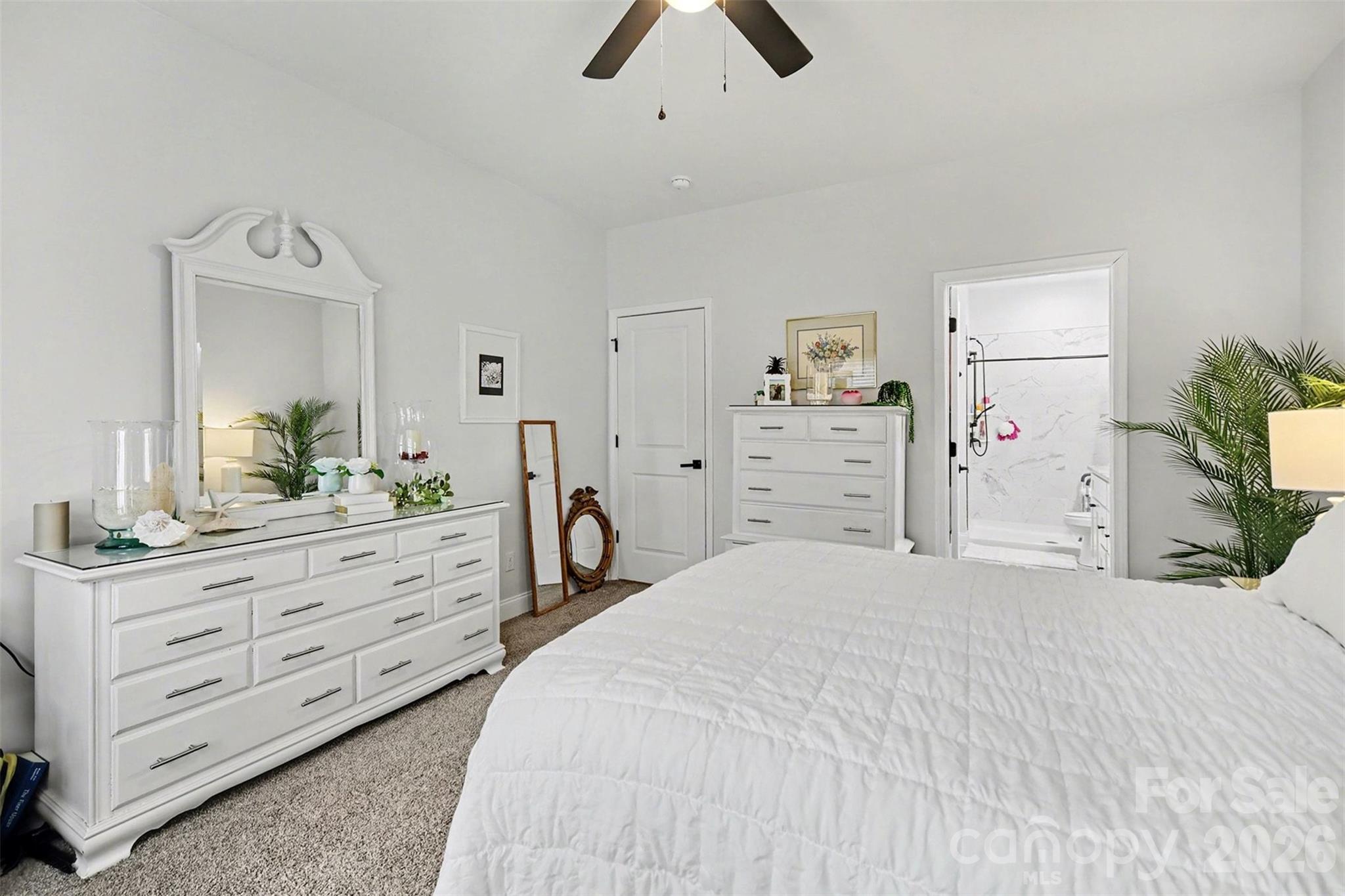 3236 Cottage Rose Lane Rock Hill, SC 29732 - Photo 15 of 27 a bedroom with a large bed and a dresser