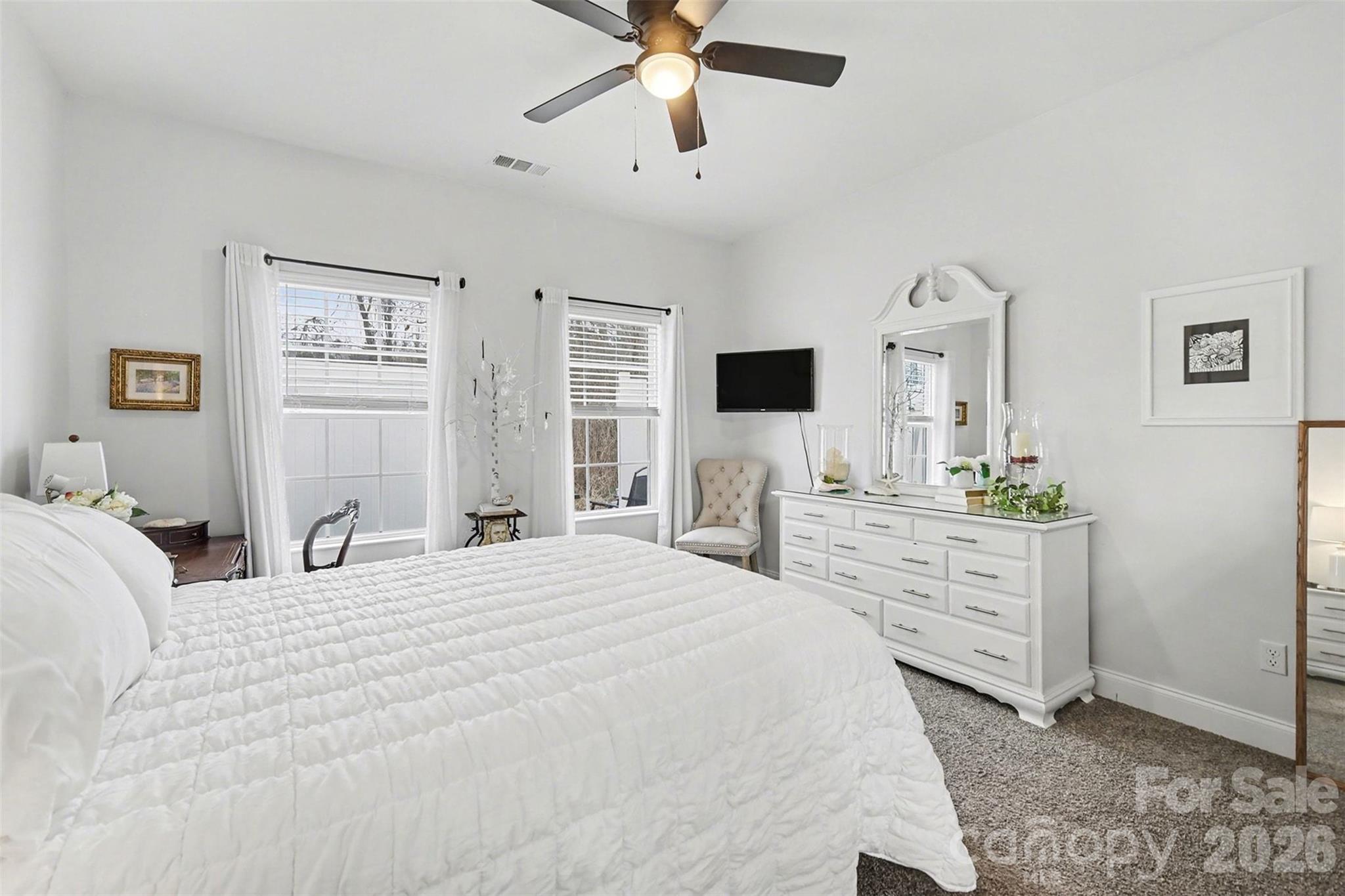 3236 Cottage Rose Lane Rock Hill, SC 29732 - Photo 16 of 27 a bedroom with a bed and a dresser