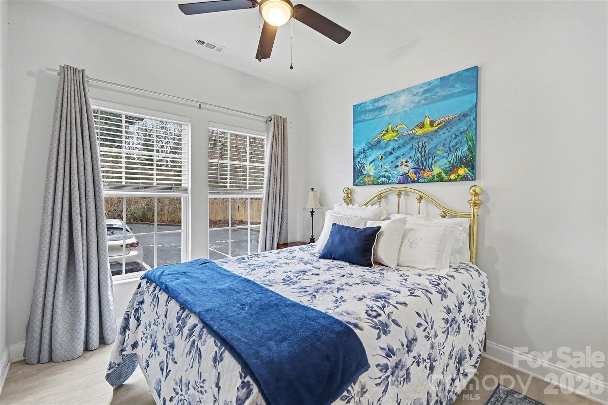 3236 Cottage Rose Lane Rock Hill, SC 29732 - Photo 19 of 27 a bedroom with a large bed and a window