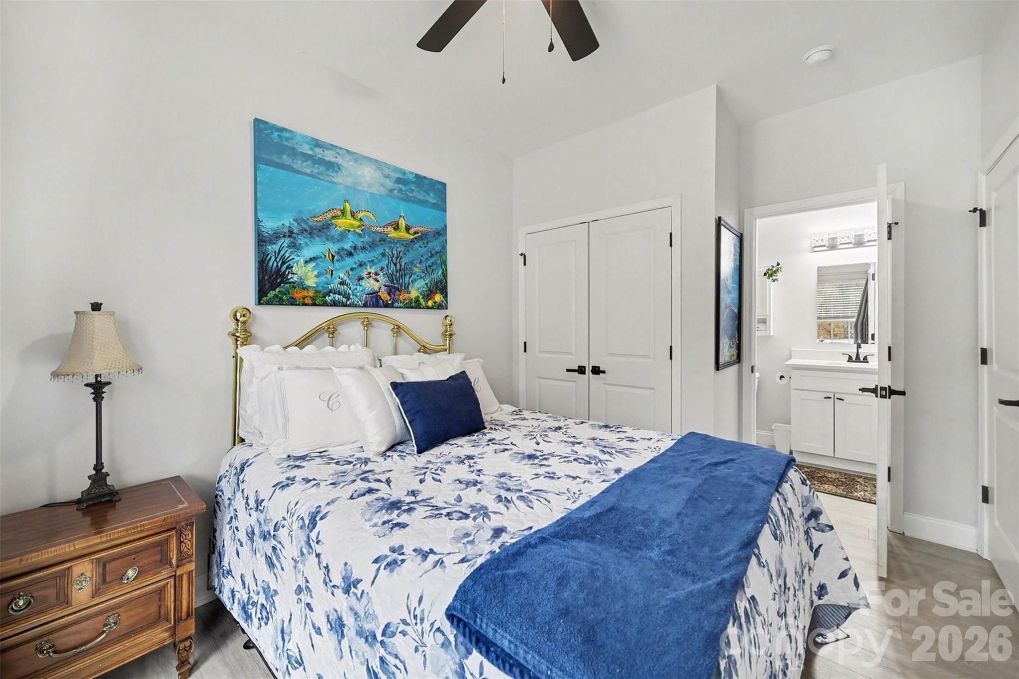 3236 Cottage Rose Lane Rock Hill, SC 29732 - Photo 20 of 27 a bedroom with a bed and a painting on the wall