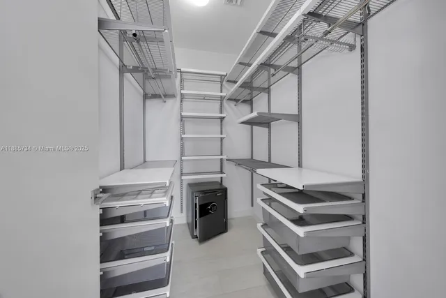 wooden floor in an empty room with windows