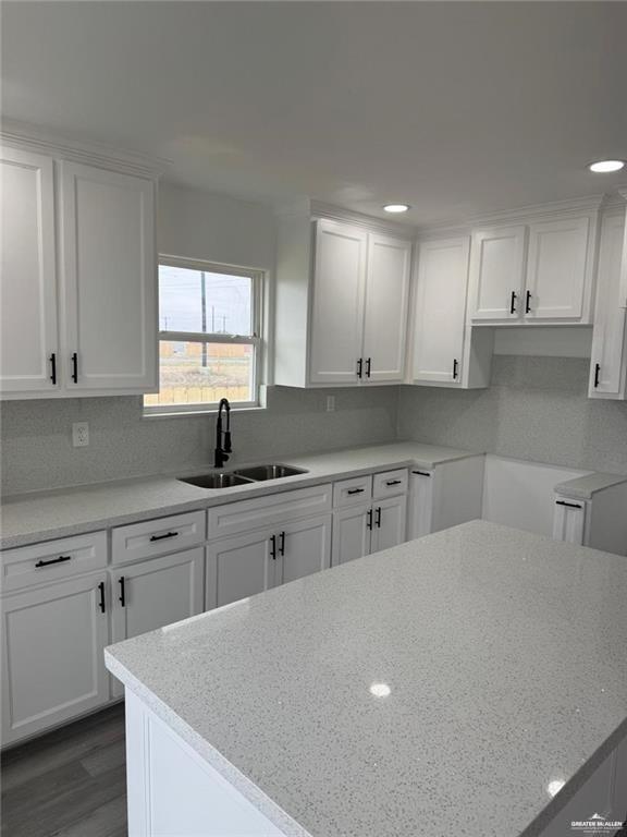 7513 Aztec Street Donna, TX 78537 - Photo 7 of 15 a kitchen with stainless steel appliances a sink stove and cabinets
