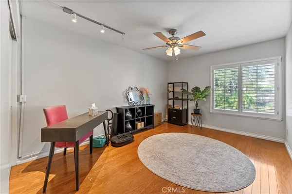 a view of a livingroom with furniture and entryway