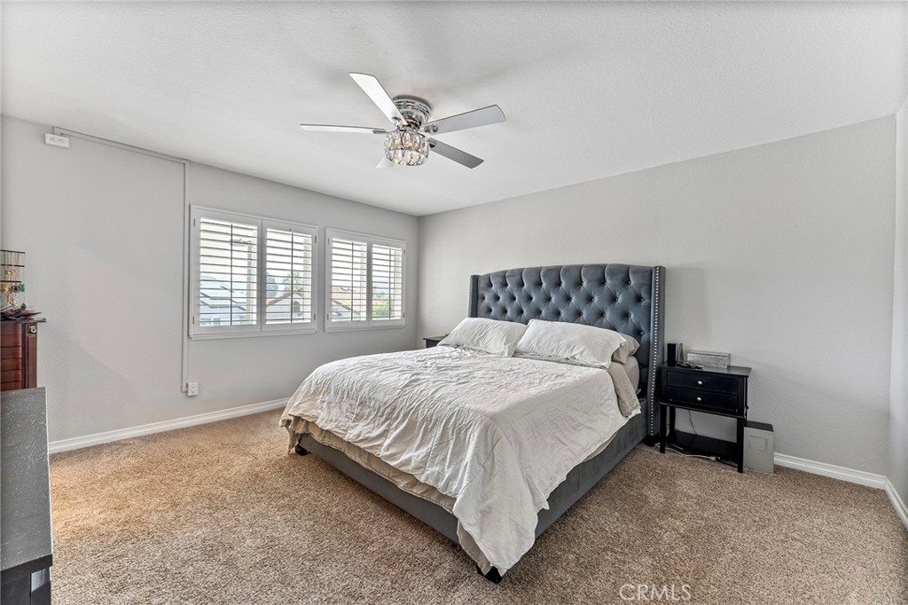 15 Ravencrest Circle Phillips Ranch, CA 91766 - Photo 10 of 22 a bedroom with a bed and window