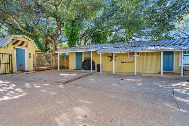 a view of a house with a outdoor space and porch