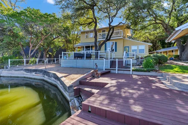 a front view of a house with swimming pool