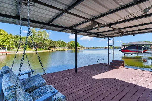 a view of a swimming pool with a patio