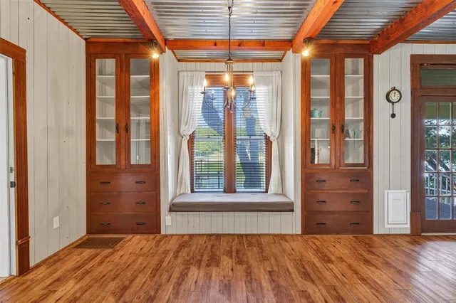 wooden floor and glass door in the balcony