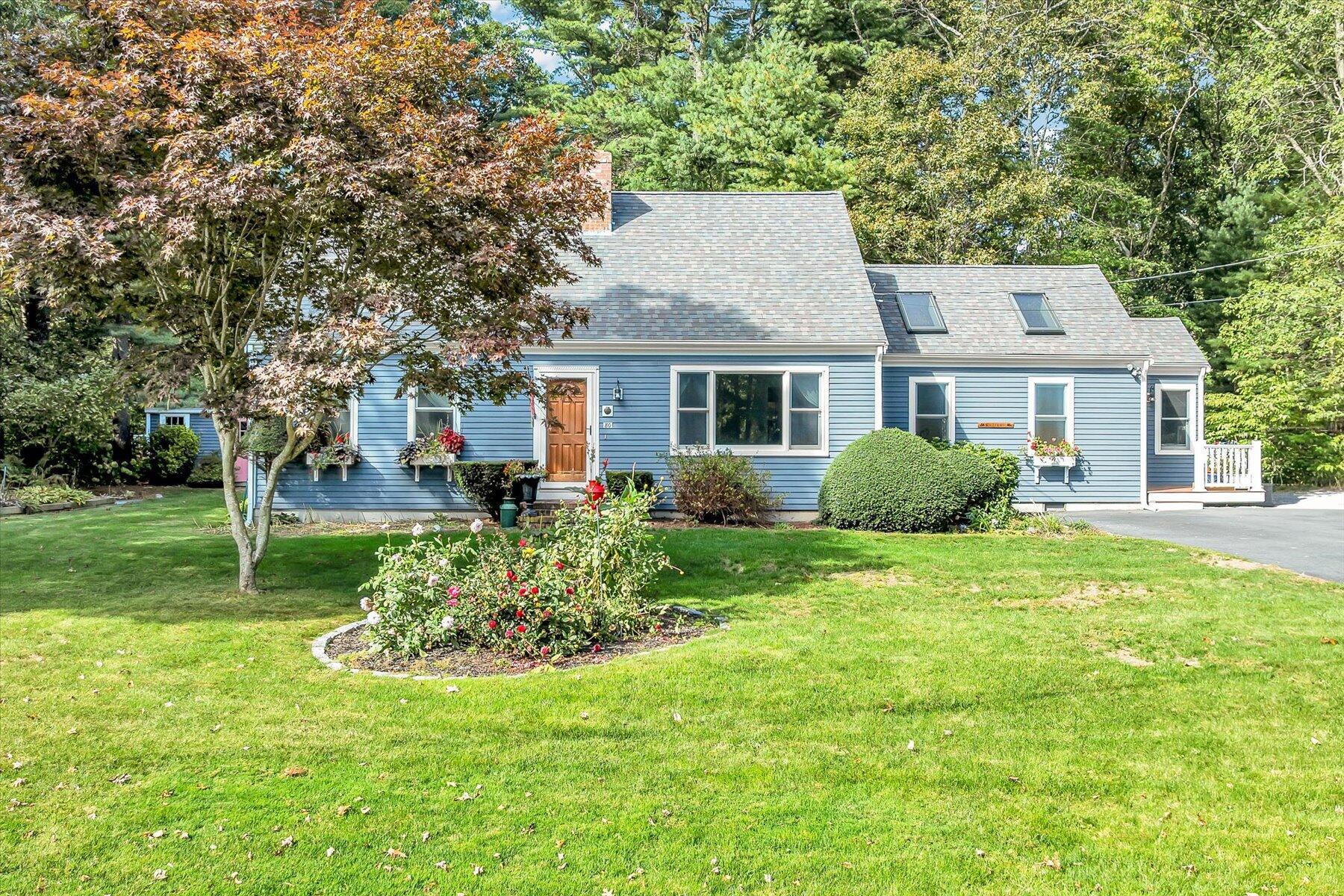 80 Curlew Way Cotuit, MA 02635 - Photo 1 of 37 a view of a house with a backyard and a tree