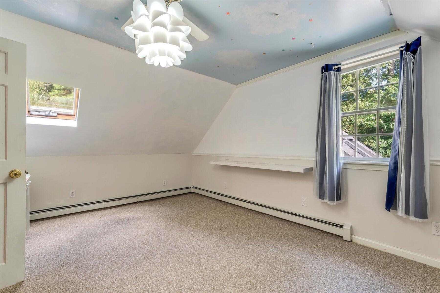 80 Curlew Way Cotuit, MA 02635 - Photo 24 of 37 en empty room with windows