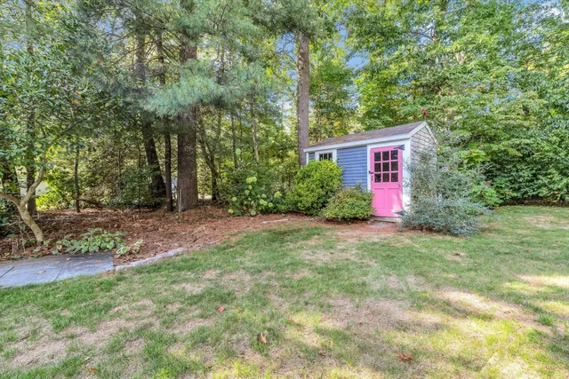 an aerial view of a house with a garden