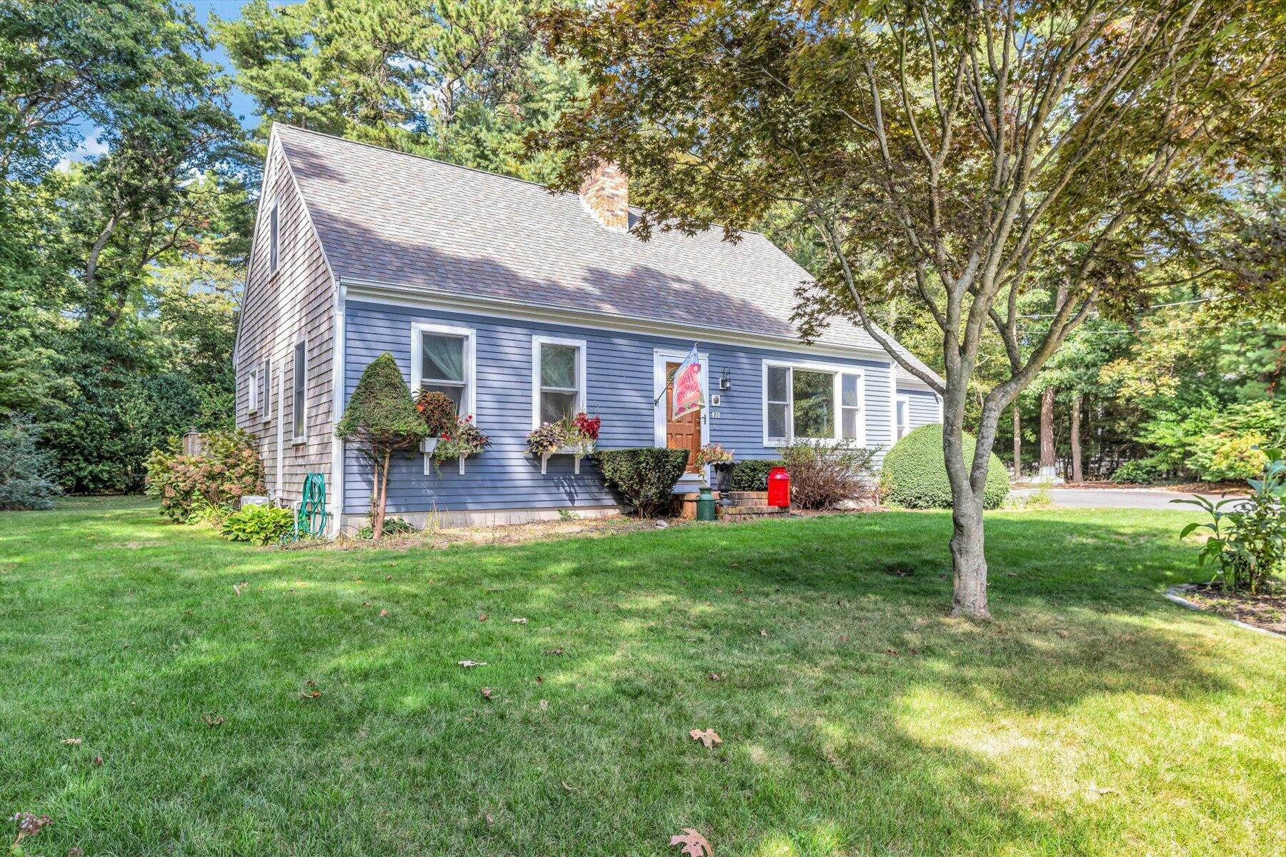 80 Curlew Way Cotuit, MA 02635 - Photo 34 of 37 a front view of house with yard and green space