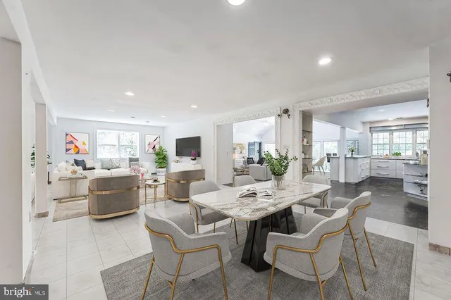 a view of living room filled with furniture and window