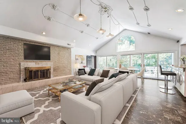 a kitchen that has a lot of cabinets in it and appliances