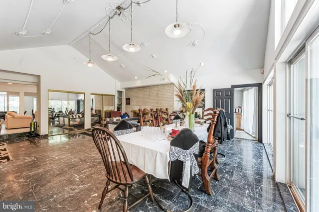 a utility room with cabinets dryer and washer