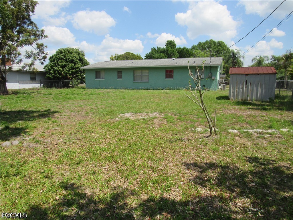 2976 Ribbon Court Fort Myers, FL 33905 - Photo 2 of 16 a view of a house with a yard