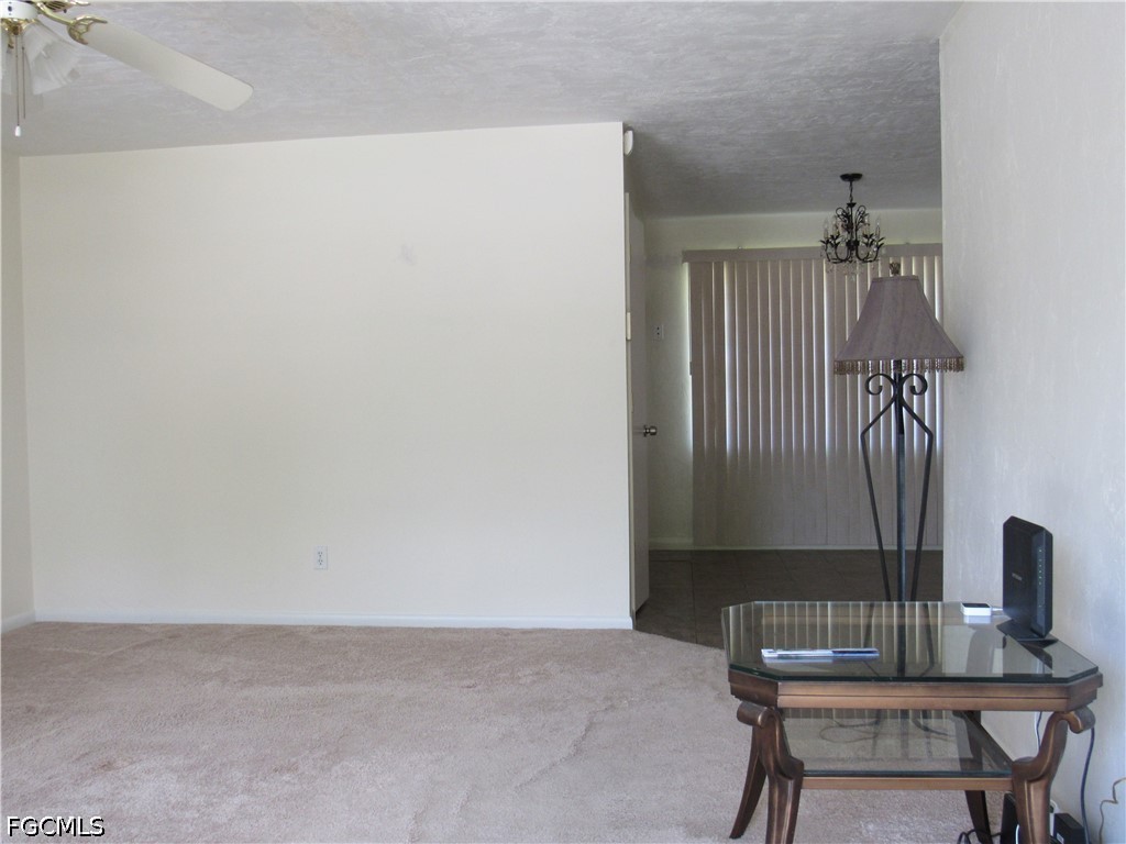 2976 Ribbon Court Fort Myers, FL 33905 - Photo 7 of 16 a view of a room with a table and chairs