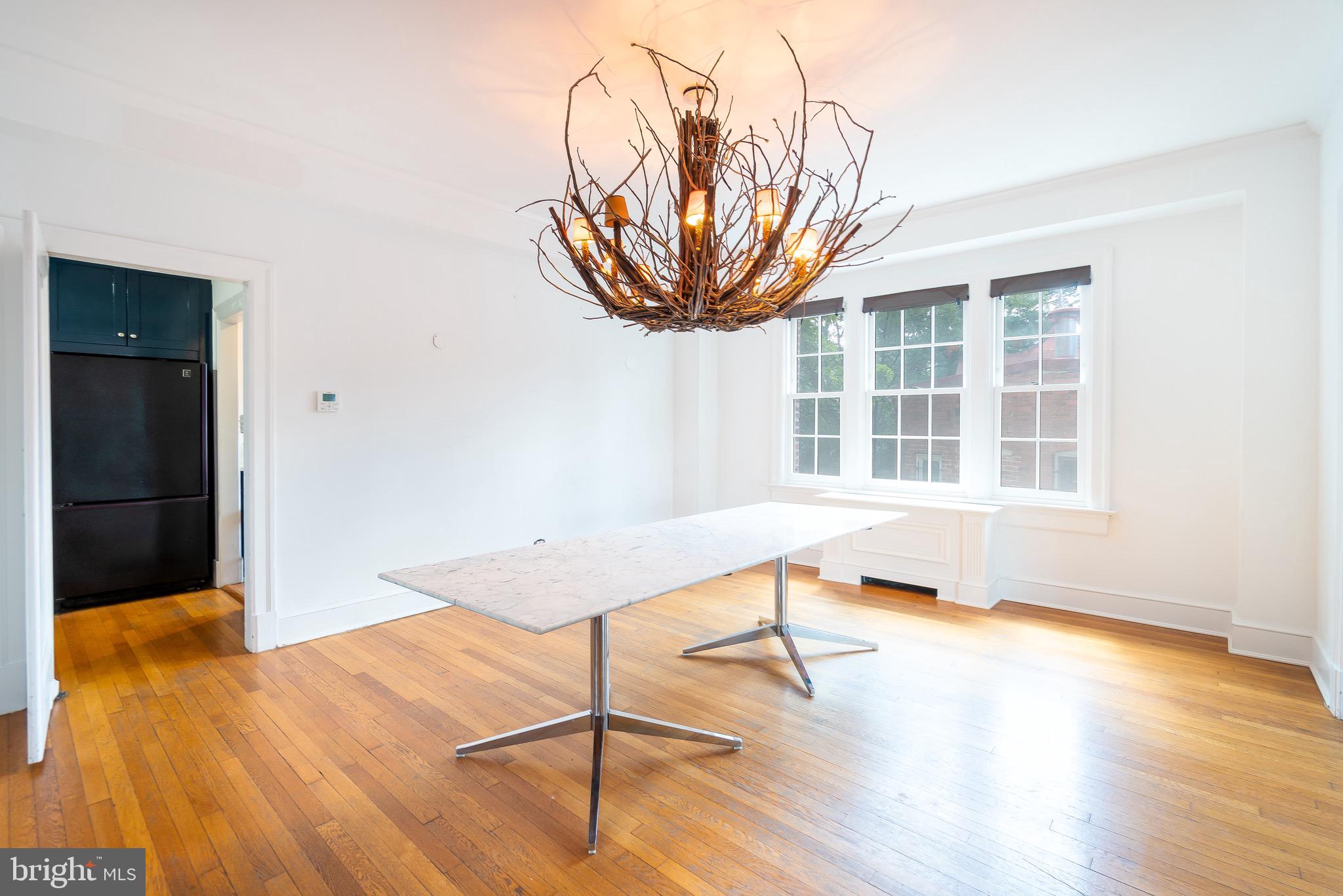 1661 Crescent Place Northwest, Unit 202 Washington, DC 20009 - Photo 7 of 19 Dining room with kitchen pantry door