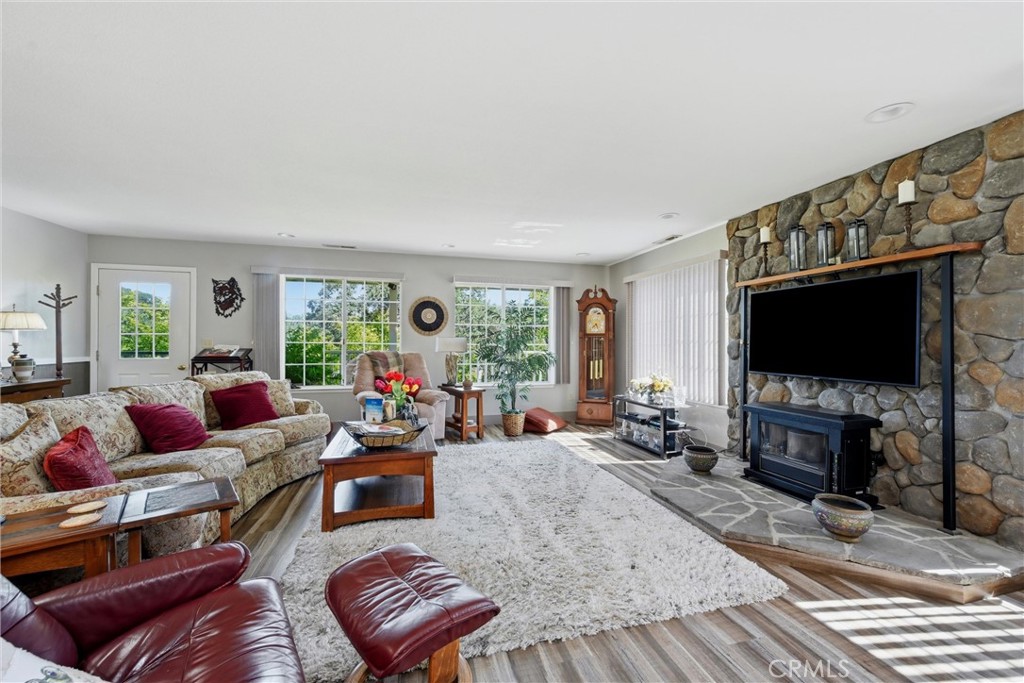 131 Ryan Road Lakeport, CA 95453 - Photo 6 of 59 Living room with kerosene fireplace insert