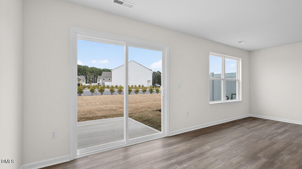 45 Red Clover Drive Angier, NC 27501 - Photo 11 of 34 a view of entryway with wooden floor