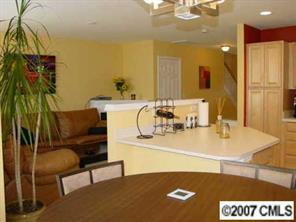 11612 Rabbit Ridge Road, Unit 11612 Charlotte, NC 28270 - Photo 2 of 8 a view of a living room and dining room