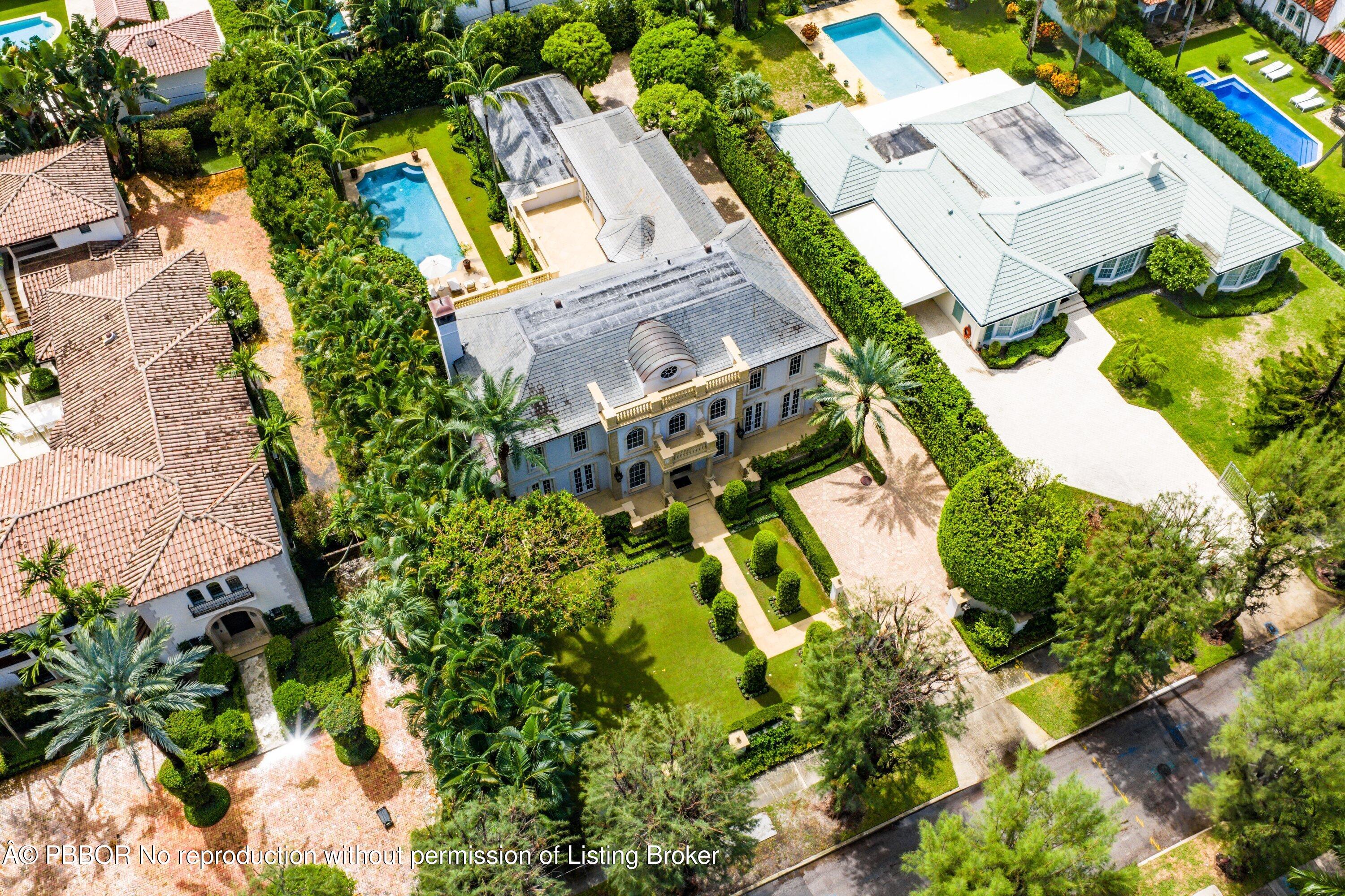 242 Wells Road Palm Beach, FL 33480 - Photo 40 of 54 an aerial view of a house with a yard swimming pool and outdoor seating