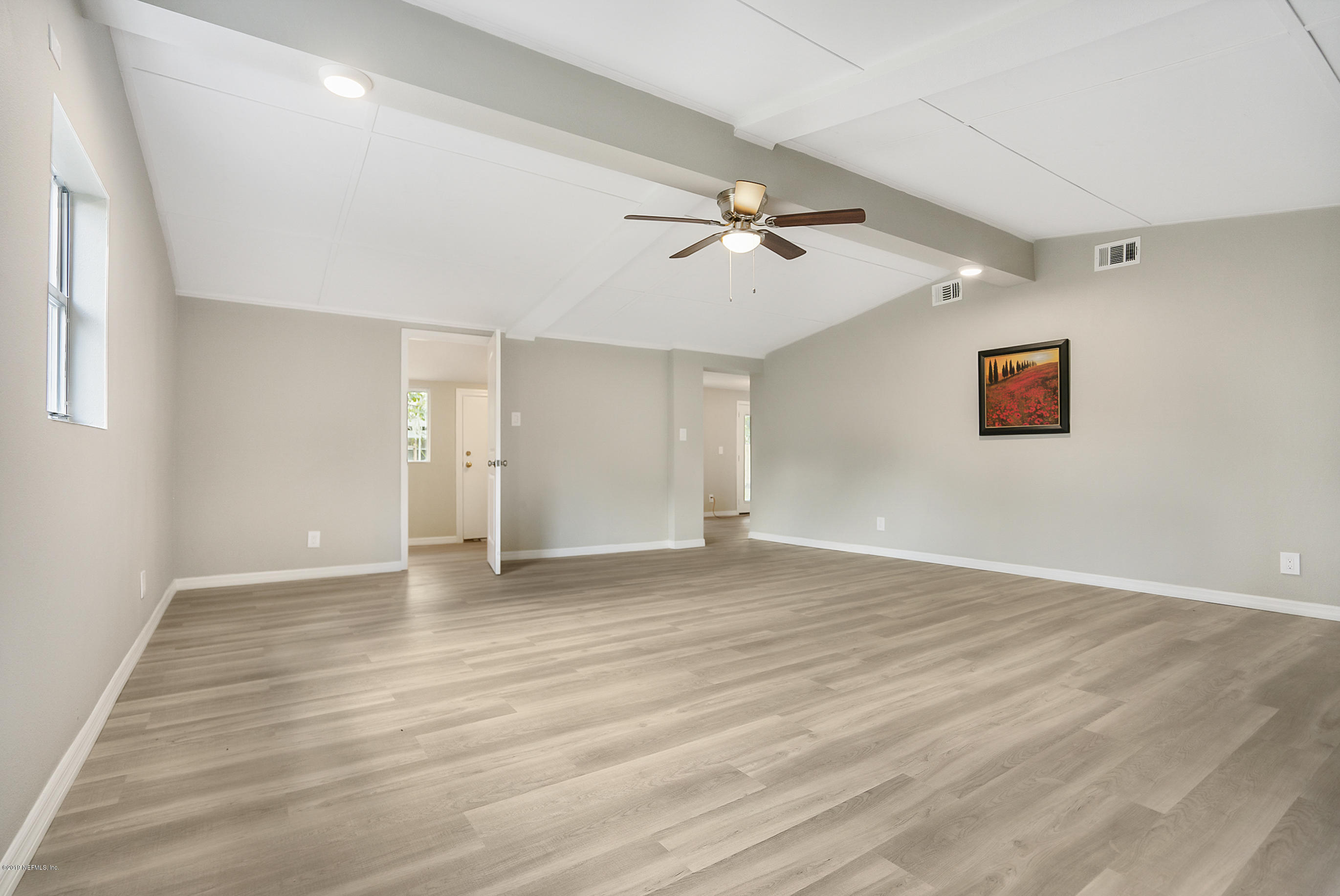 10483 Tulsa Road Jacksonville, FL 32218 - Photo 20 of 30 a view of an empty room with a window