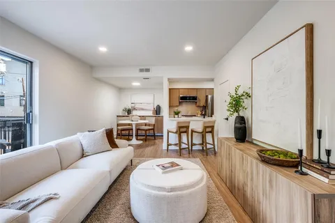 a living room with furniture and a table