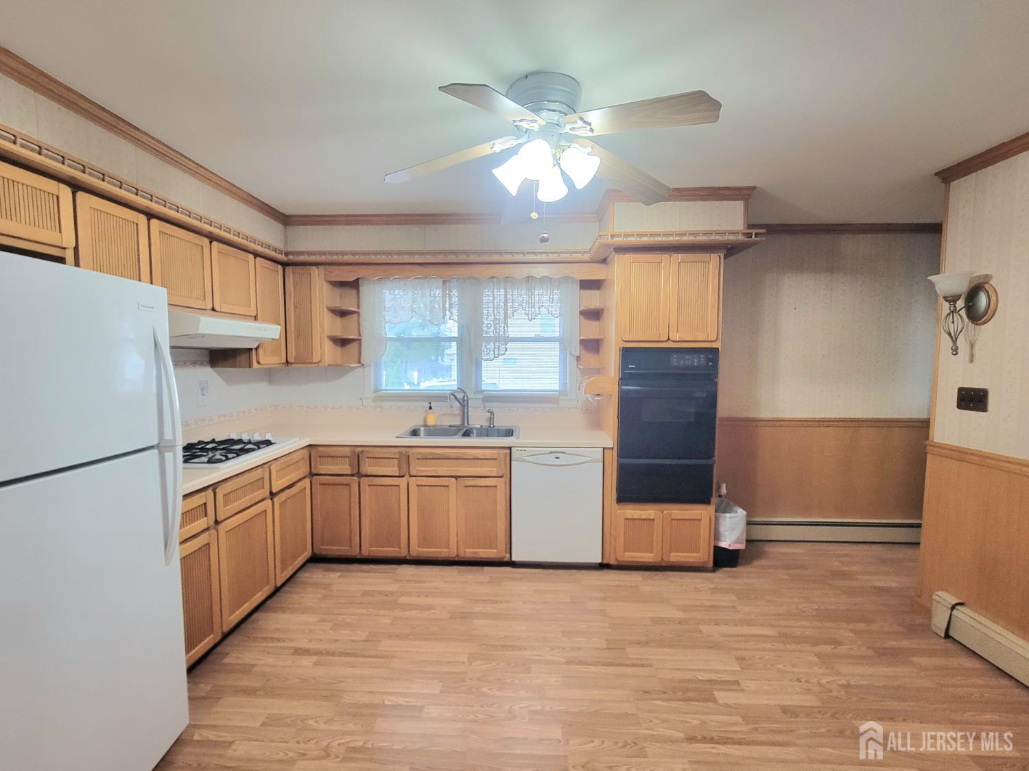 937 North Concourse Keyport, NJ 07735 - Photo 11 of 27 a kitchen with a refrigerator and a stove top oven