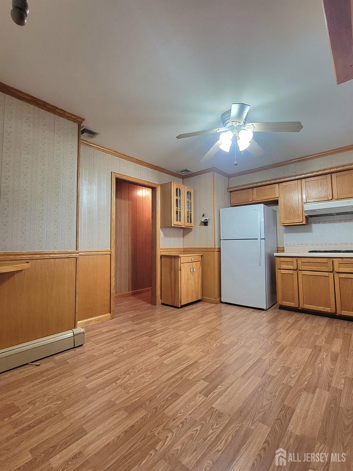 937 North Concourse Keyport, NJ 07735 - Photo 12 of 27 a view of a kitchen with a sink and a refrigerator