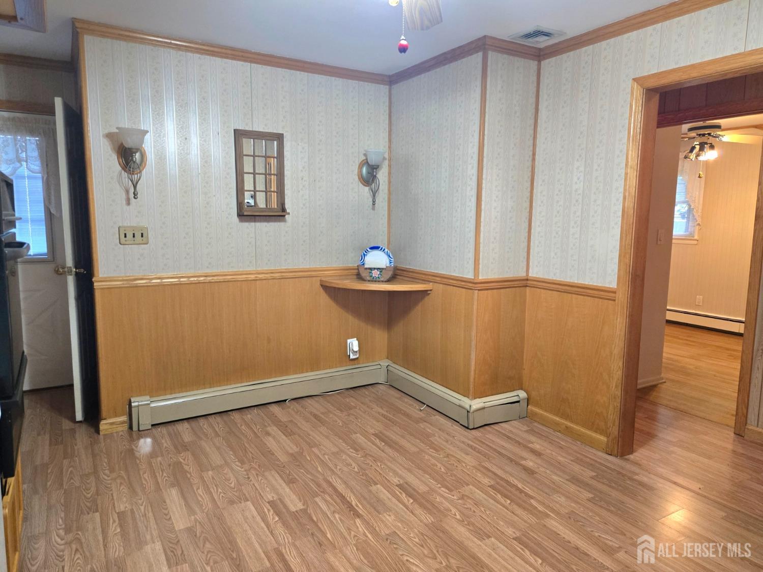 937 North Concourse Keyport, NJ 07735 - Photo 13 of 27 an empty room with wooden floor and windows