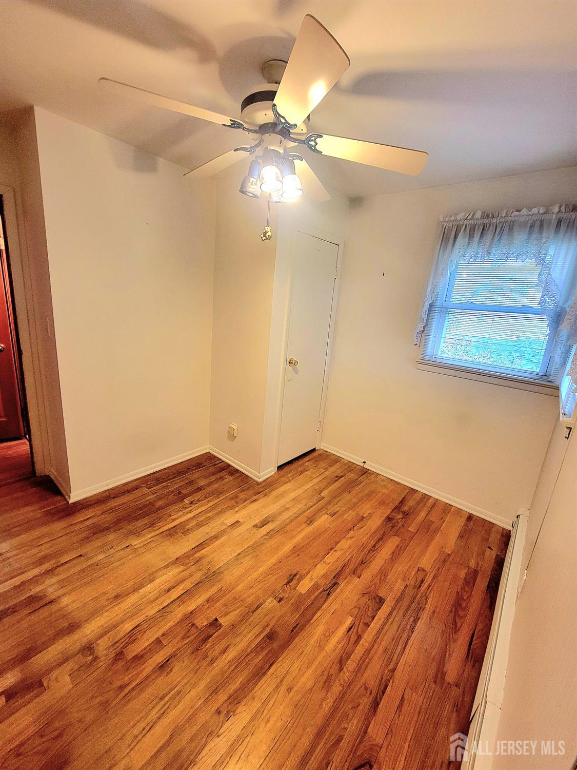 937 North Concourse Keyport, NJ 07735 - Photo 20 of 27 a view of a room with wooden floor and cabinet