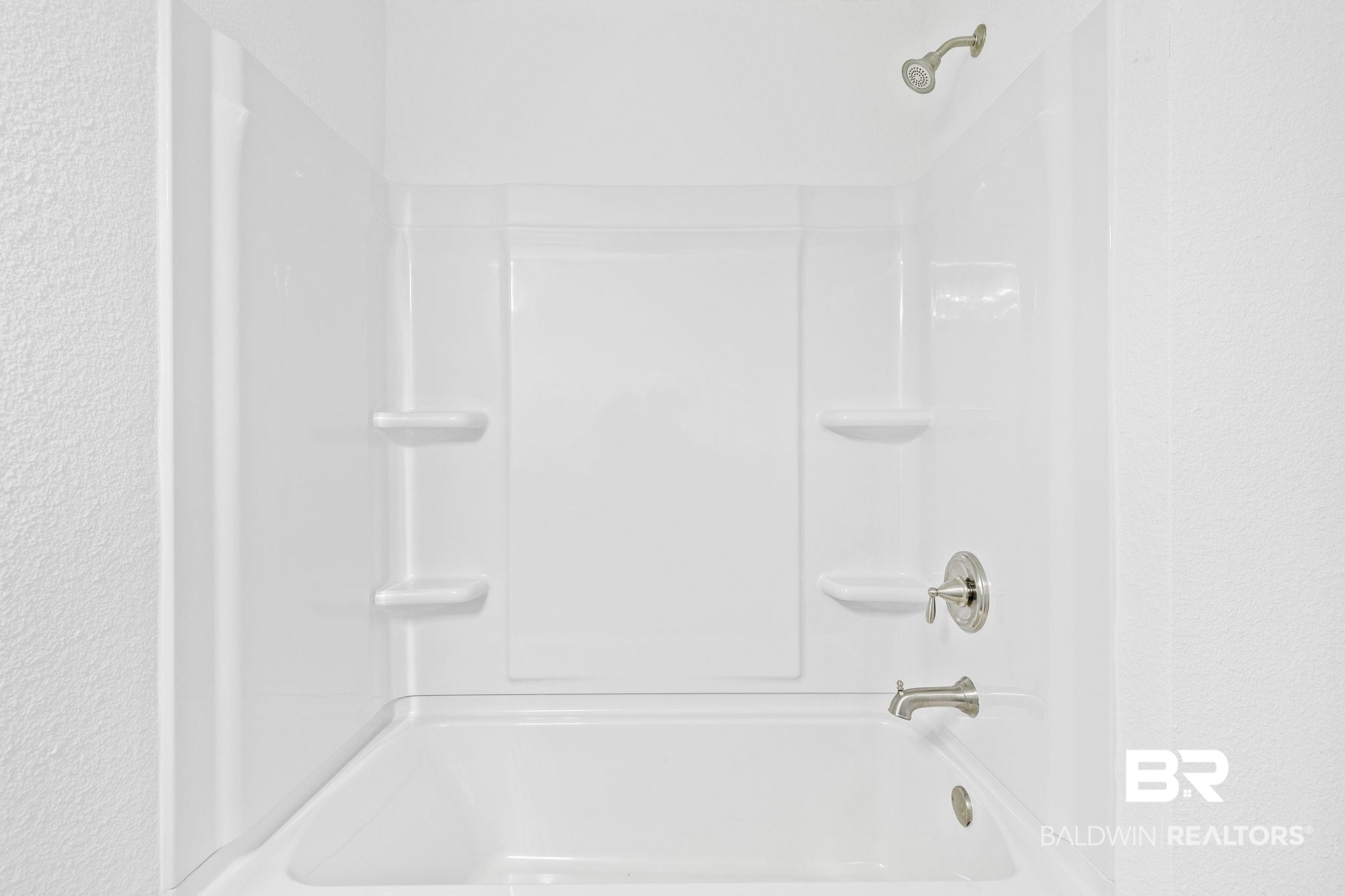 16014 Alabama Avenue Silverhill, AL 36576 - Photo 25 of 50 Bathroom featuring shower / bathtub combination