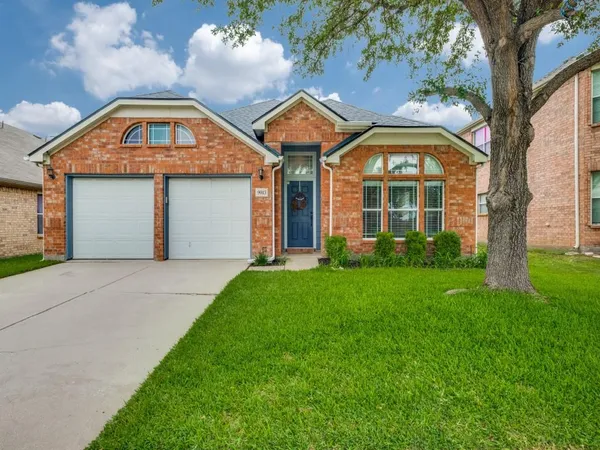 a front view of house with yard