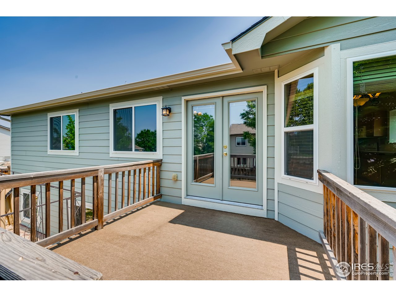 223 Aspen Grove Way Severance, CO 80550 - Photo 29 of 31 a view of a house with porch