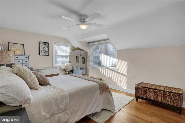 a bedroom with a workspace