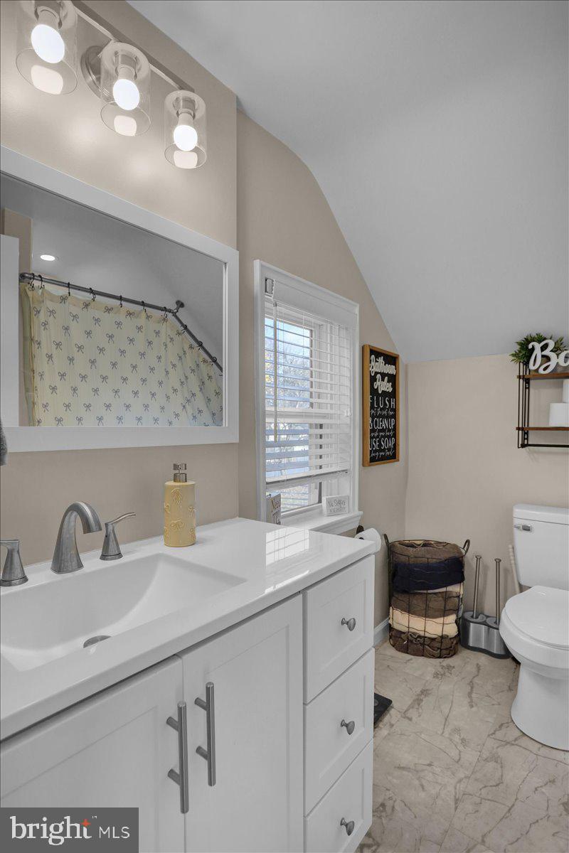 321 Jefferson Boulevard Reading, PA 19609 - Photo 16 of 32 a bathroom with a sink and a toilet