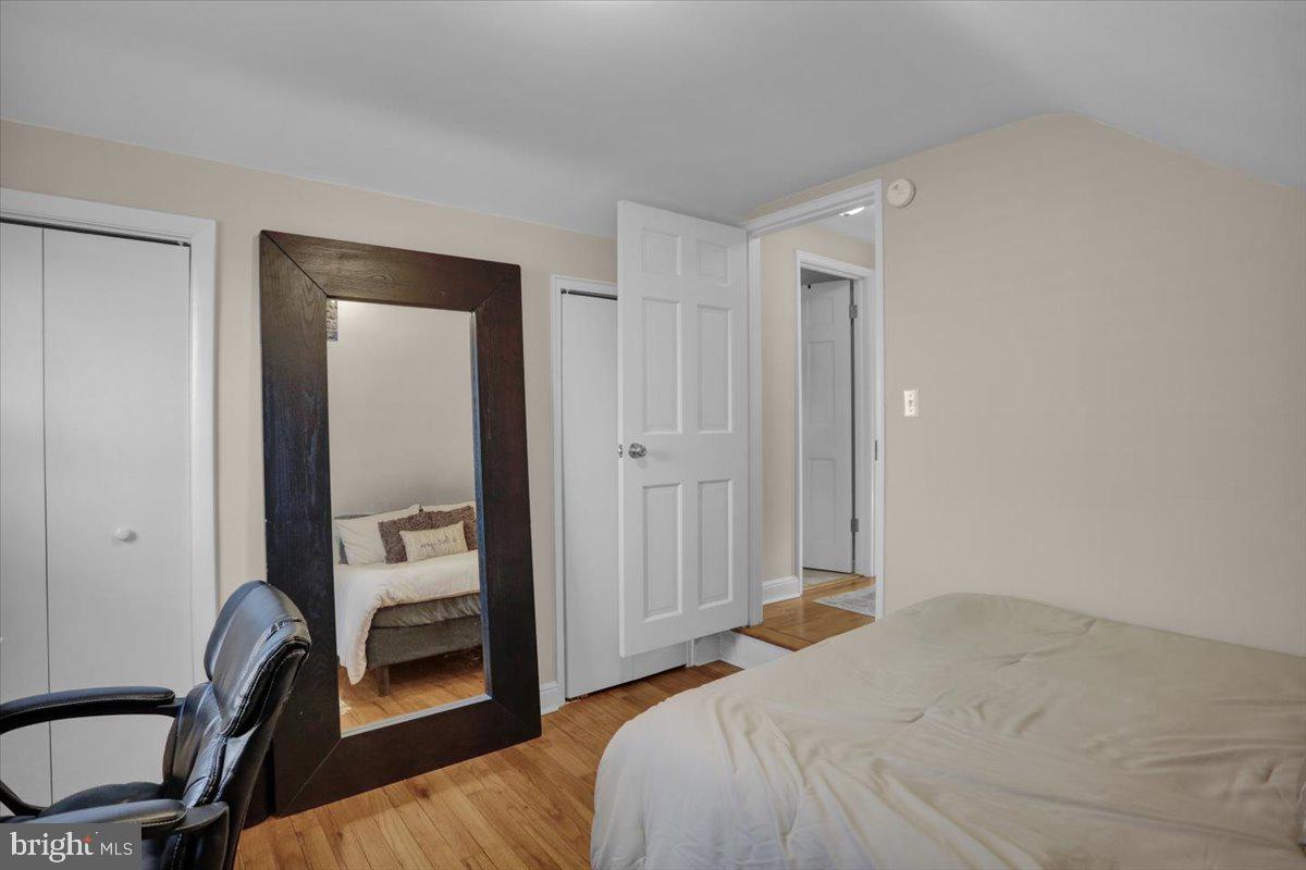 321 Jefferson Boulevard Reading, PA 19609 - Photo 18 of 32 a bedroom with a bed and a chair