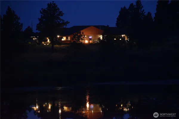 a view of a yard and a fire pit
