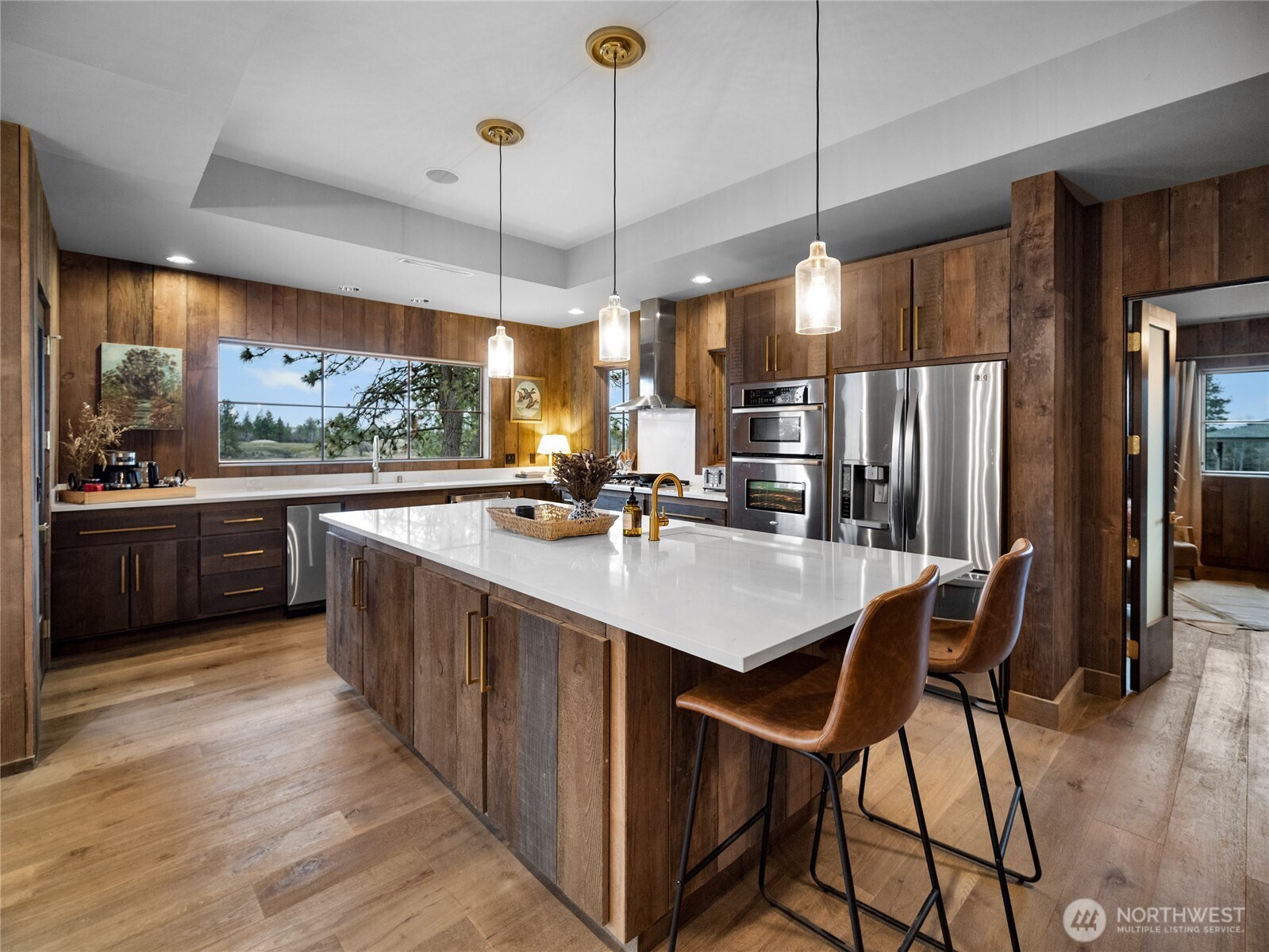 37227 South Long Road Cheney, WA 99004 - Photo 5 of 39 a kitchen with stainless steel appliances a sink a counter top space a large window and stainless steel appliances