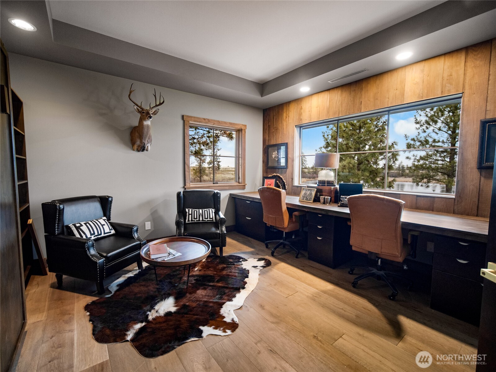 37227 South Long Road Cheney, WA 99004 - Photo 10 of 39 a living room with furniture and a flat screen tv