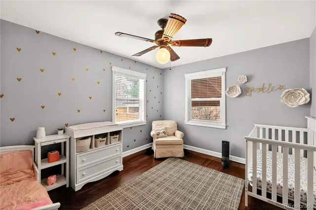 a room with furniture a rug and a window