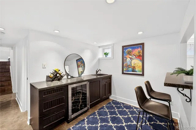 a view of a workspace with furniture