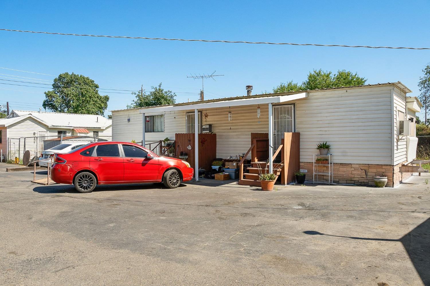 6837 Rio Linda Boulevard Rio Linda, CA 95673 - Photo 37 of 51 a view of car parked in front of garage